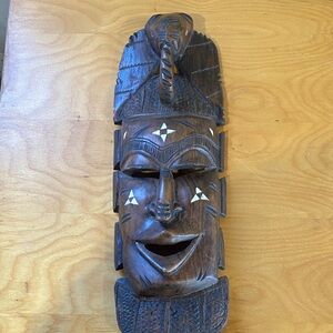 Artisan Carved Wooden Mask with Brown and White Accents